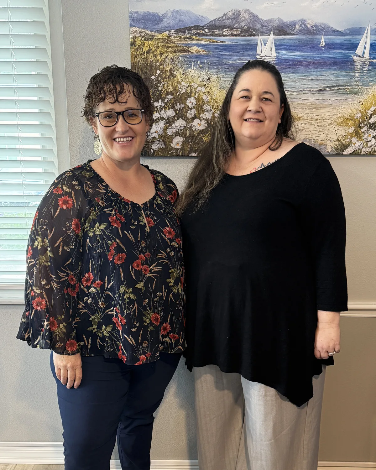 business tax strategist Sarasota, Tax with Integrity co-owners Malinda Olupitan and Jennifer Lewis standing together