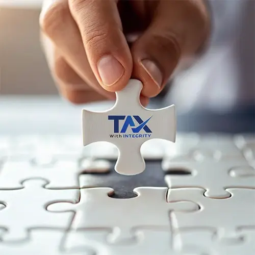 Hand placing puzzle piece with logo